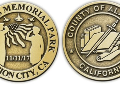 Commemorative coin distributed to veterans at the dedication event.