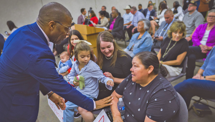James Jackson shaking hands